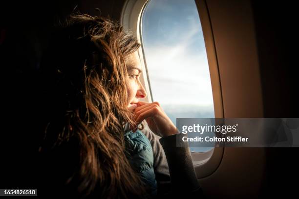 airplane window view - window seat stock pictures, royalty-free photos & images