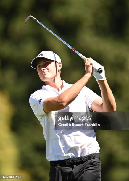 Ludvig Aberg of Sweden plays his approach shot on the fourth hole during Day Three of the Omega European Masters at Crans-sur-Sierre Golf Club on...