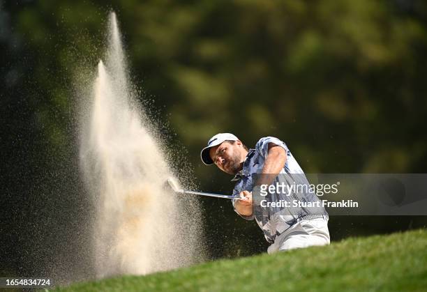 Romain Langasque of France plays his bunker shot on the fouth hole during Day Three of the Omega European Masters at Crans-sur-Sierre Golf Club on...