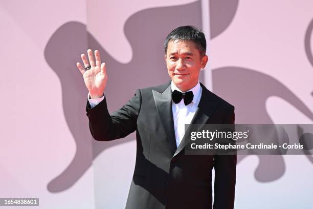 Tony Leung Chiu-Wai attends a red carpet for the Golden Lion For Lifetime Achievement & the movie "The Lion's Share: A History Of The Mostra" at the...