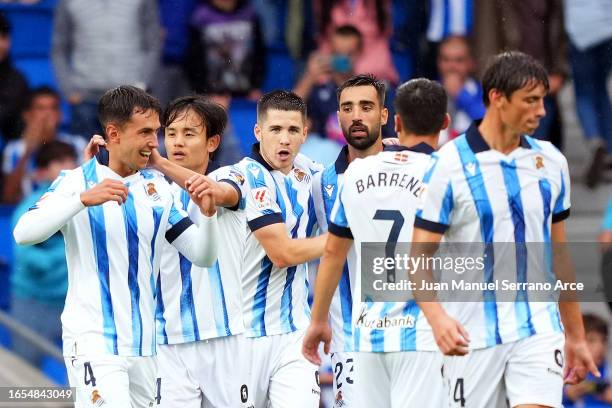 Martin Zubimendi of Real Sociedad celebrates with teammates after scoring the team's third goal during the LaLiga EA Sports match between Real...