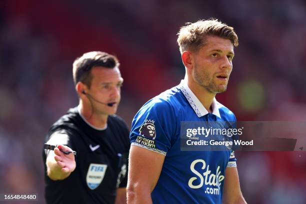 James Tarkowski of Everton leaves the pitch after an injury during the Premier League match between Sheffield United and Everton FC at Bramall Lane...