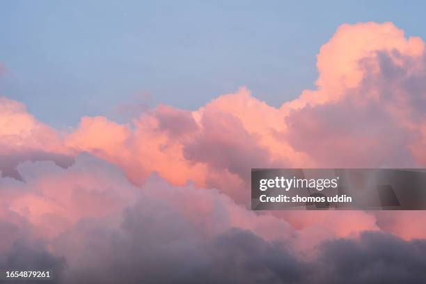 dramatic clouds sky at sunset - peach colour stock pictures, royalty-free photos & images