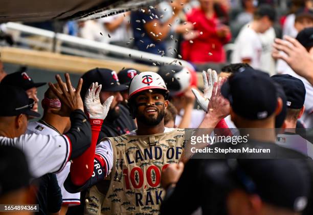 Willi Castro of the Minnesota Twins celebrates with teammates after hitting a home run in the eighth inning of the game against the New York Mets at...