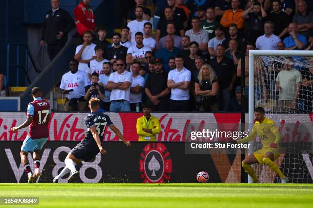 Lyle Foster of Burnley scores the team's first goal during the Premier League match between Burnley FC and Tottenham Hotspur at Turf Moor on...