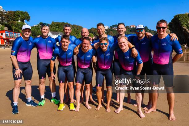 Alix Popham, former Welsh International Rugby Player and Head for Change Ironman Wales team members on Tenby North Beach the day before setting out...