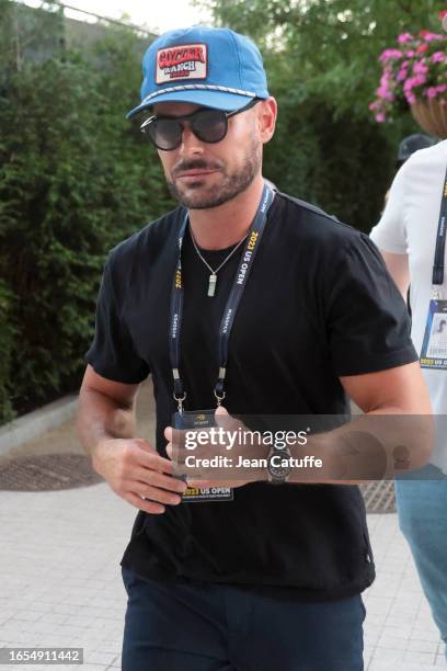 Zac Efron attends day five of the 2023 US Open at Arthur Ashe Stadium at the USTA Billie Jean King National Tennis Center on September 1, 2023 in the...