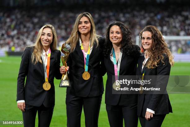 Olga Carmona Garcia, Misa Rodriguez, Ivana Andres and Teresa Abelleira of Real Madrid and Spain pose for a photo with the FIFA Women's World Cup...