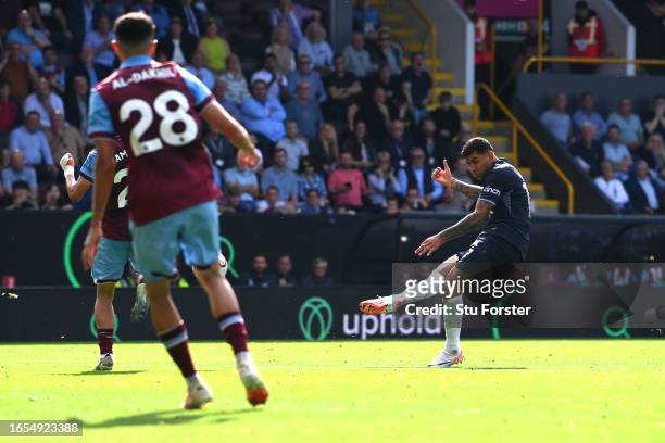 Cristian Romero of Tottenham Hotspur scores the team's second goal during the Premier League match between Burnley FC and Tottenham Hotspur at Turf...