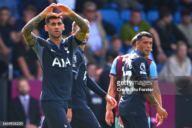 Cristian Romero of Tottenham Hotspur celebrates after scoring the team's second goal during the Premier League match between Burnley FC and Tottenham...