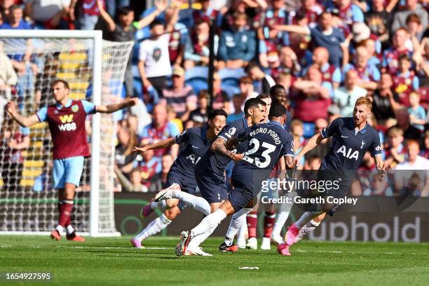 Cristian Romero of Tottenham Hotspur celebrates after scoring the team's second goal during the Premier League match between Burnley FC and Tottenham...