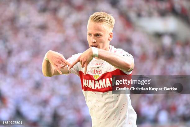 Chris Fuehrich of VfB Stuttgart celebrates after scoring the team's fourth goal during the Bundesliga match between VfB Stuttgart and Sport-Club...