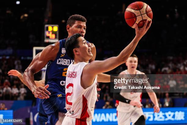 Yuki Togashi of Japan drives to the basket against Edy Tavares of Cape Verde during the FIBA Basketball World Cup Classification 17-32 Group O game...