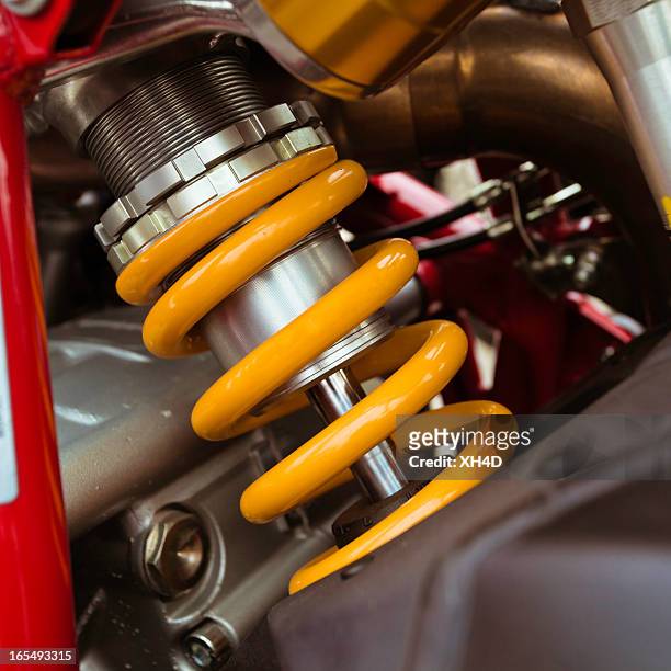 motorcycle shock absorber - shock absorber stock pictures, royalty-free photos & images