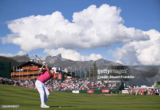 Matt Fitzpatrick of England plays his approach shot on the 18th hole during Day Three of the Omega European Masters at Crans-sur-Sierre Golf Club on...