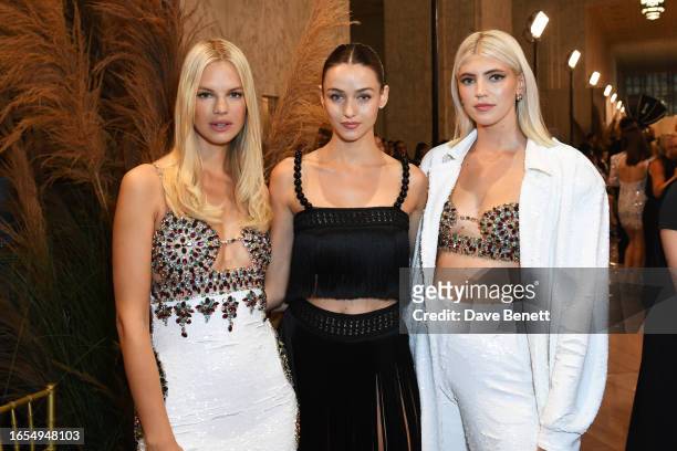 Nadine Leopold, Gabby Westbrook-Patrick and Devon Windsor attend the PatBo SS24 front row during New York Fashion Week September 2023 at on September...