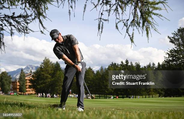 Oliver Bekker of South Africa plays his approach shot on the th hole during Day Three of the Omega European Masters at Crans-sur-Sierre Golf Club on...