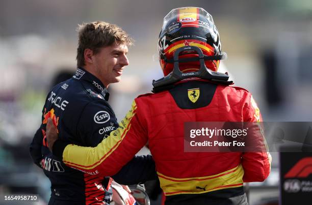 Pole position qualifier Carlos Sainz of Spain and Ferrari and Second placed qualifier Max Verstappen of the Netherlands and Oracle Red Bull Racing...
