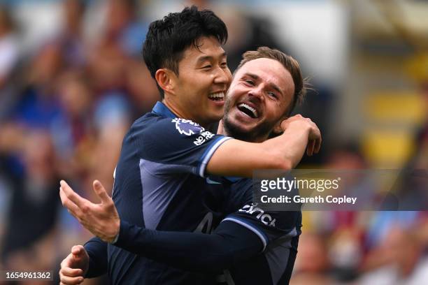Heung-Min Son of Tottenham Hotspur celebrates with teammate James Maddison after scoring the team's fourth goal during the Premier League match...