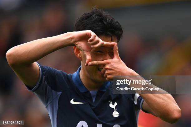 Heung-Min Son of Tottenham Hotspur celebrates after scoring the team's fifth goal and his hat-trick during the Premier League match between Burnley...