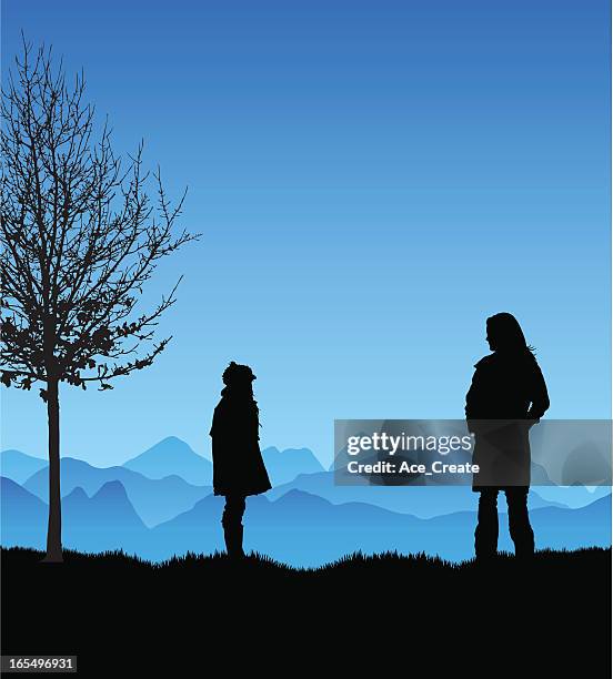 child struggling with a cold walk - bare tree silhouette stock illustrations