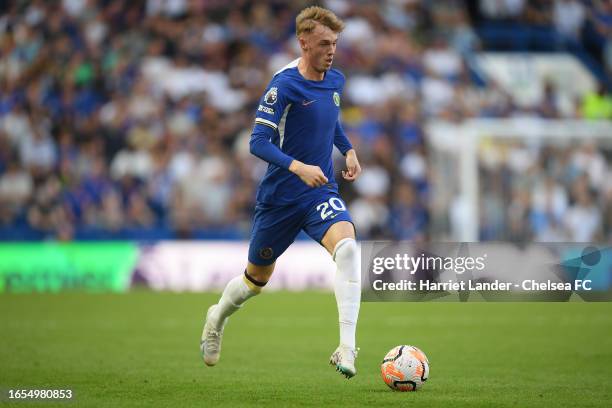 Cole Palmer of Chelsea runs with the ball during the Premier League match between Chelsea FC and Nottingham Forest at Stamford Bridge on September...