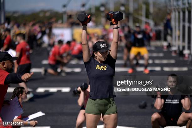 An athlete lifts weights during a crossfit competition during the 6th edition of the Bop Games, at the Mineirao stadium in Belo Horizonte, state of...