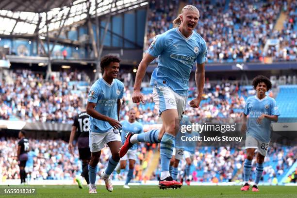 Erling Haaland of Manchester City celebrates after scoring the team's fifth goal and his hat-trick during the Premier League match between Manchester...