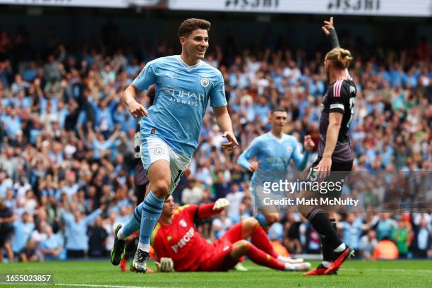 Julian Alvarez of Manchester City celebrates after scoring the team's first goal during the Premier League match between Manchester City and Fulham...