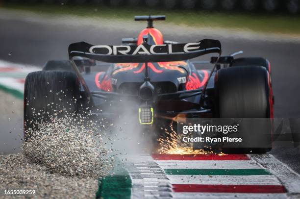 Max Verstappen of the Netherlands driving the Oracle Red Bull Racing RB19 kicks up gravel during qualifying ahead of the F1 Grand Prix of Italy at...