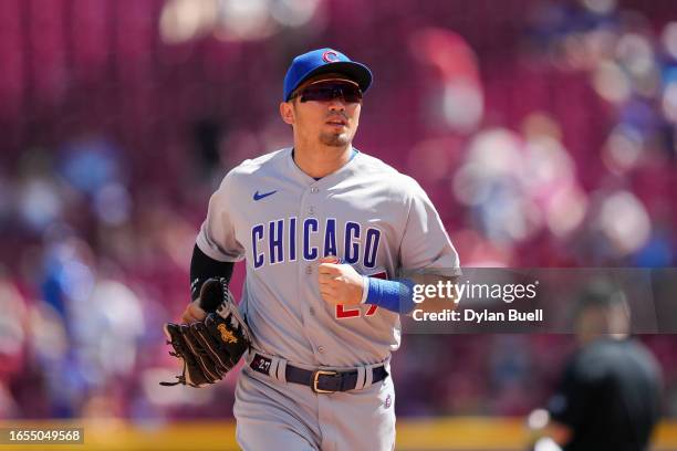 Seiya Suzuki of the Chicago Cubs jogs across the field in the sixth inning against the Cincinnati Reds during game one of a doubleheader at Great...