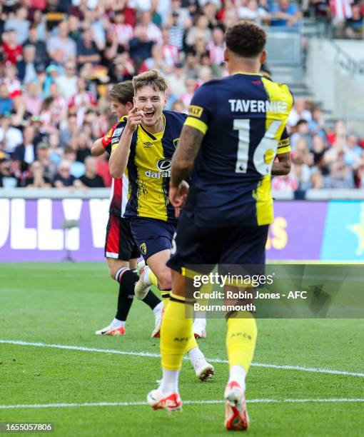 David Brooks of Bournemouth scores a goal to make it 2-1 and runs to celebrate with team-mate Marcus Tavernier during the Premier League match...