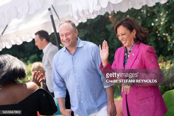 Vice President Kamala Harris and Second Gentleman Doug Emhoff greet guests during a celebration in honor of the 50th anniversary of hip hop at the...