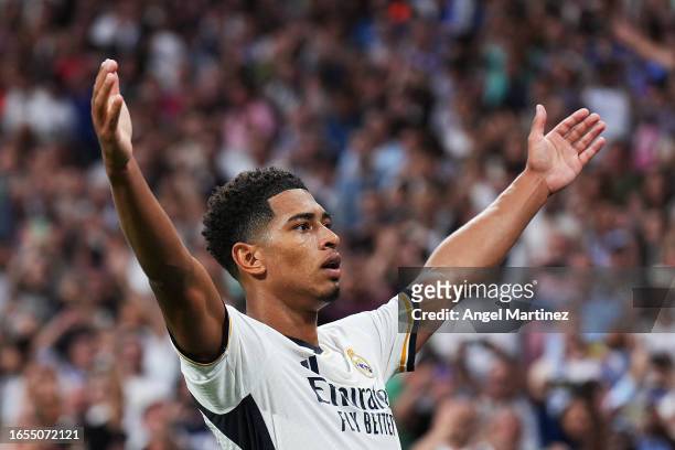 Jude Bellingham of Real Madrid celebrates after scoring the team's second goal during the LaLiga EA Sports match between Real Madrid CF and Getafe CF...