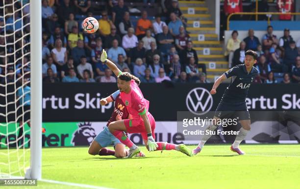 Spurs striker Heung-Min Song scores the first Tottenham goal past goalkeeper James Trafford during the Premier League match between Burnley FC and...