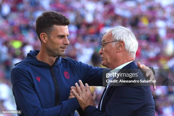 Thiago Motta, Head Coach of Bologna and Claudio Ranieri, Head Coach of Cagliari, shake hands prior to the Serie A TIM match between Bologna FC and...