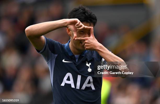 Heung-Min Son of Tottenham Hotspur celebrates after scoring the team's fifth goal and his hat-trick during the Premier League match between Burnley...