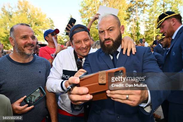Joe Marler of England takes a picture with a supporter during the Rugby World Cup 2023 Welcome Ceremony at Convention Center on September 02, 2023 in...