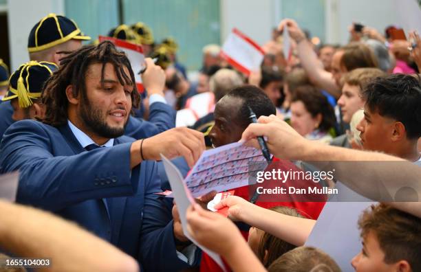 Lewis Ludlam of England signs autographs for fans during the Rugby World Cup 2023 Welcome Ceremony at Convention Center on September 02, 2023 in Le...