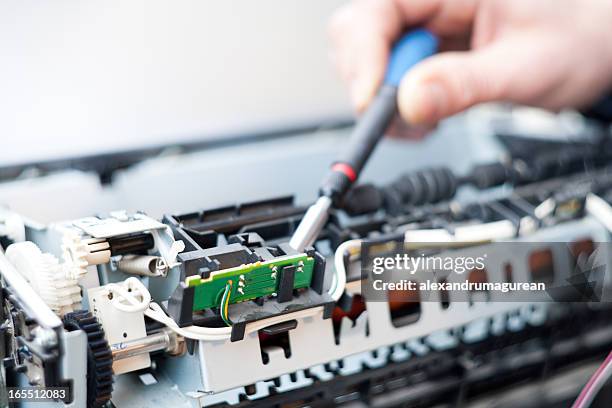 laser printer repairman - computer printer stock pictures, royalty-free photos & images