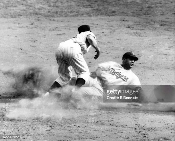Catcher Roy Campanella of the Brooklyn Dodgers is out at second as he tried to strech a single into a double as Jerry Coleman of the New York Yankees...