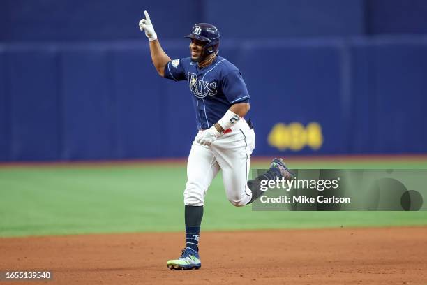 Yandy Diaz of the Tampa Bay Rays celebrates after his walk-off home run against the Seattle Mariners during the ninth inning of a baseball game at...