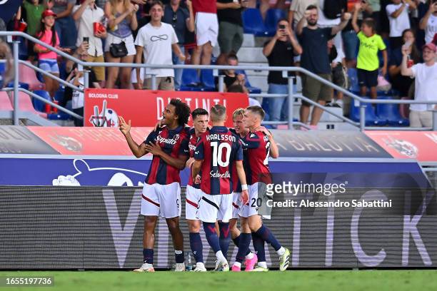 Joshua Zirkzee of Bologna celebrates with teammates after scoring the team's first goal during the Serie A TIM match between Bologna FC and Cagliari...