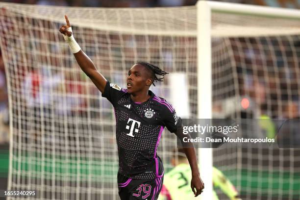 Mathys Tel of Bayern Munich celebrates after scoring the team's second goal during the Bundesliga match between Borussia Mönchengladbach and FC...