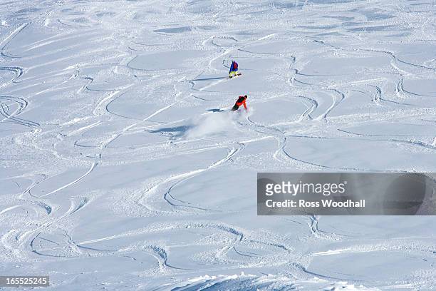 snowboarders making tracks in snow - snowboard stock-fotos und bilder