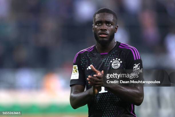 Dayot Upamecano of Bayern Munich applauds the fans following the team's victory during the Bundesliga match between Borussia Mönchengladbach and FC...