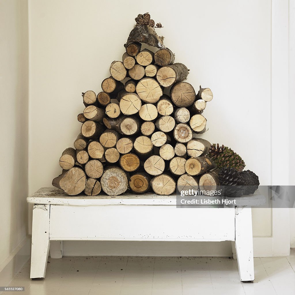 Pile of firewood on bench