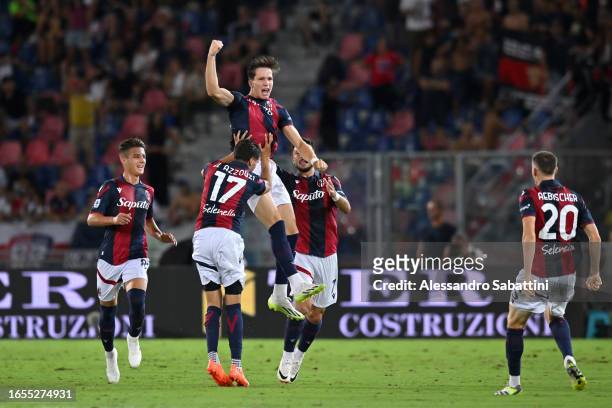 Giovanni Fabbian celebrates with teammates after scoring the team's second goal during the Serie A TIM match between Bologna FC and Cagliari Calcio...