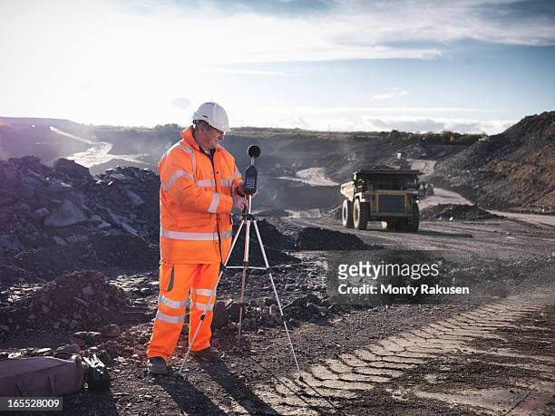 ecologist monitoring sound in surface coal mine - loud man imagens e fotografias de stock