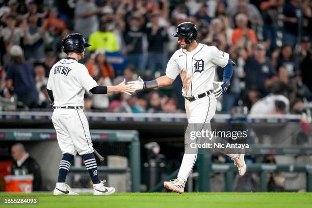 Matt Vierling of the Detroit Tigers celebrates a home run against the Chicago White Sox during the bottom of the seventh inning at Comerica Park on...